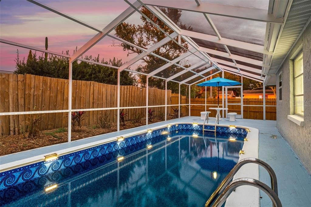 7835 Birchwood Drive Port Richey, FL 34668 - Photo 2 of 14 a view of a balcony with door