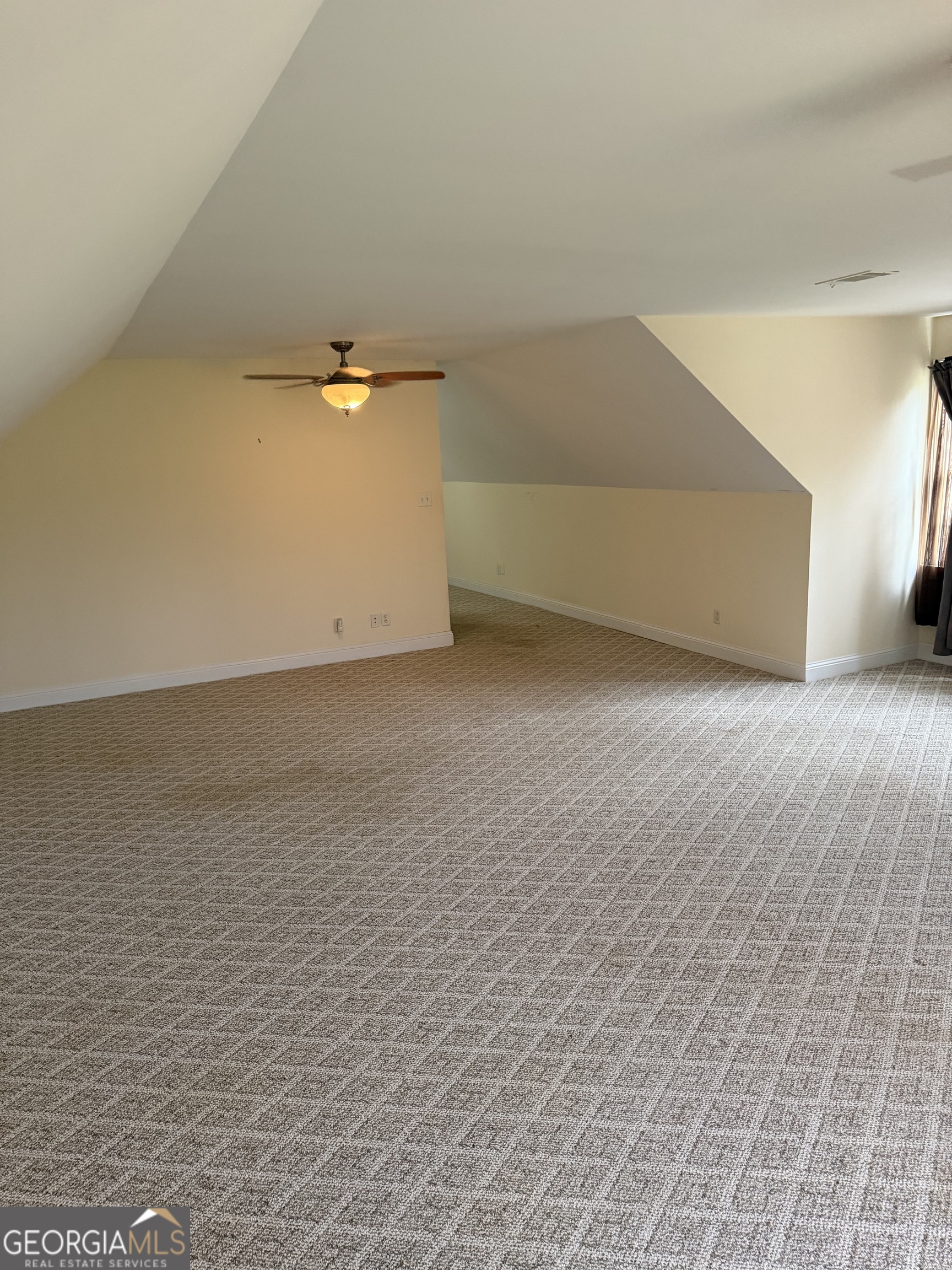 302 Norris Road Barnesville, GA 30204 - Photo 61 of 65 a view of a livingroom with an empty space and a ceiling fan