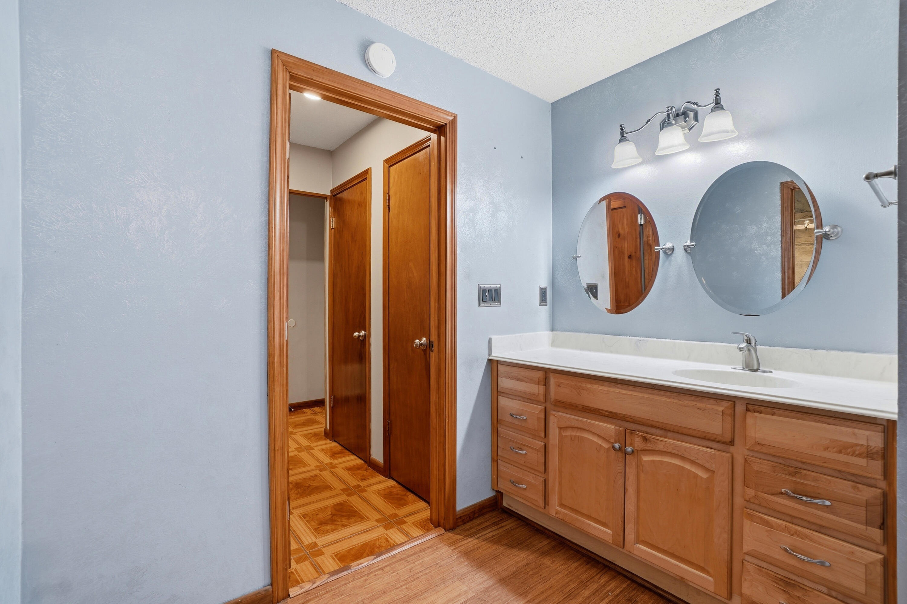 324 John King Road Crestview, FL 32539 - Photo 16 of 28 a bathroom with a sink and a mirror