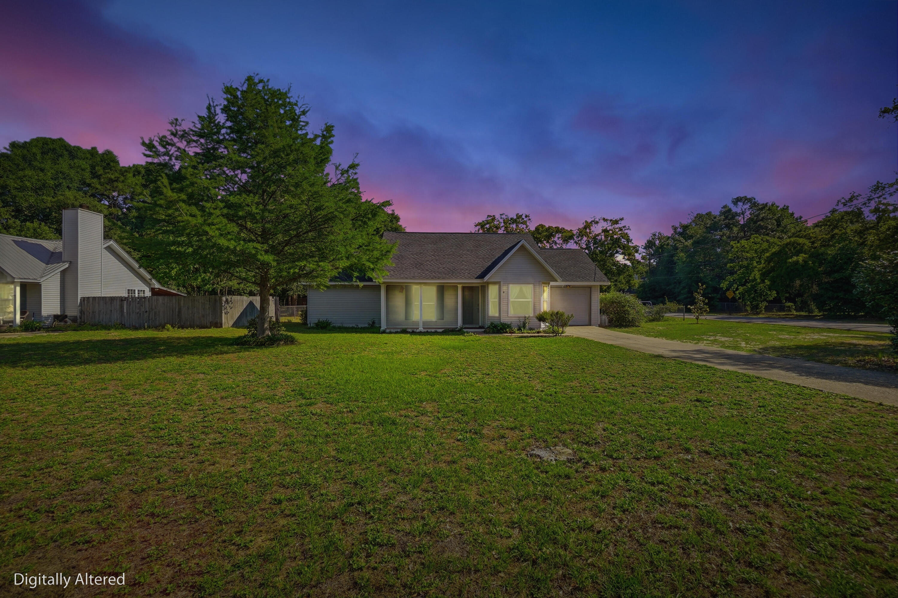324 John King Road Crestview, FL 32539 - Photo 2 of 28 a front view of a house with a yard