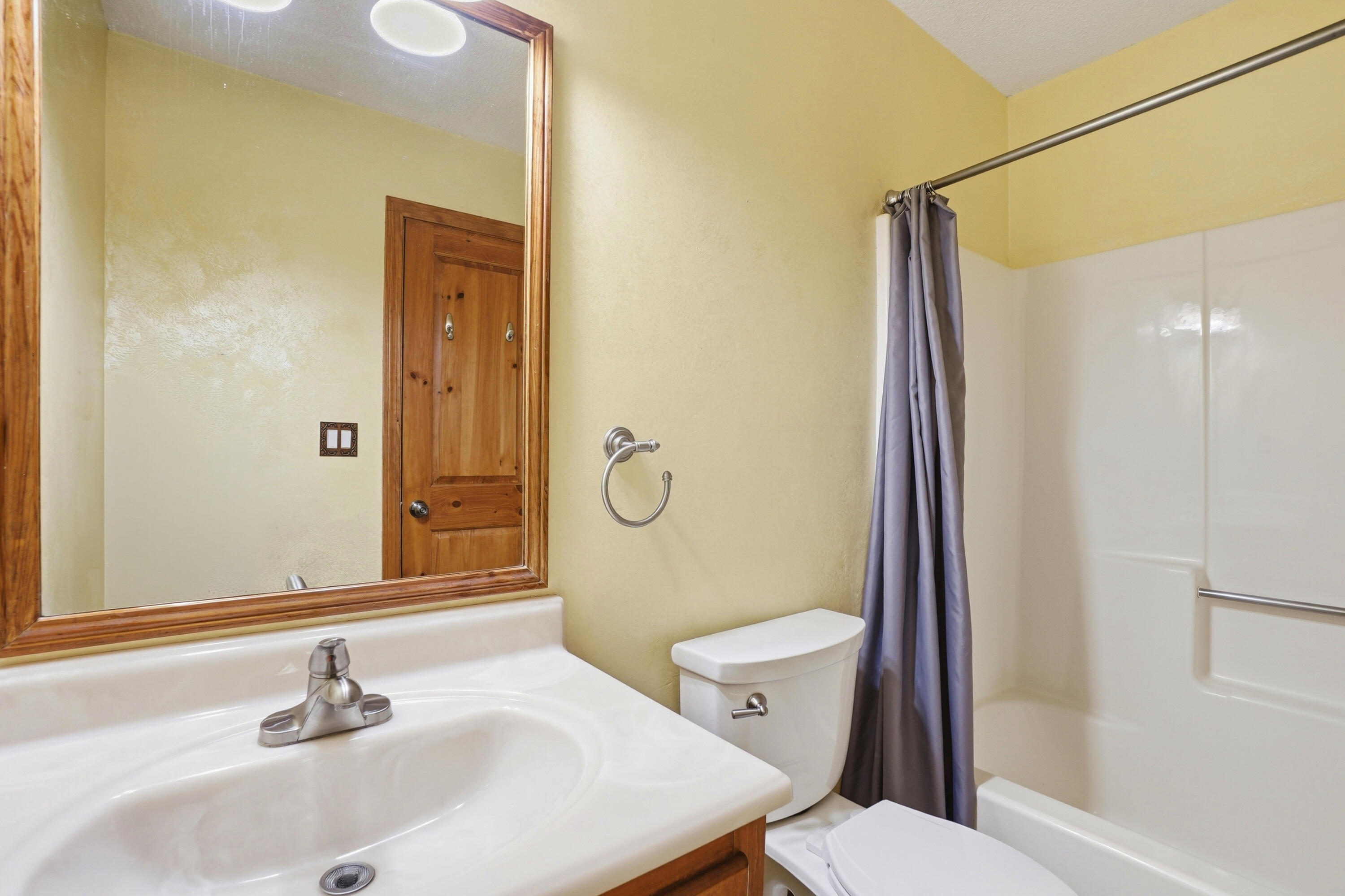 324 John King Road Crestview, FL 32539 - Photo 21 of 28 a bathroom with a sink a toilet and shower