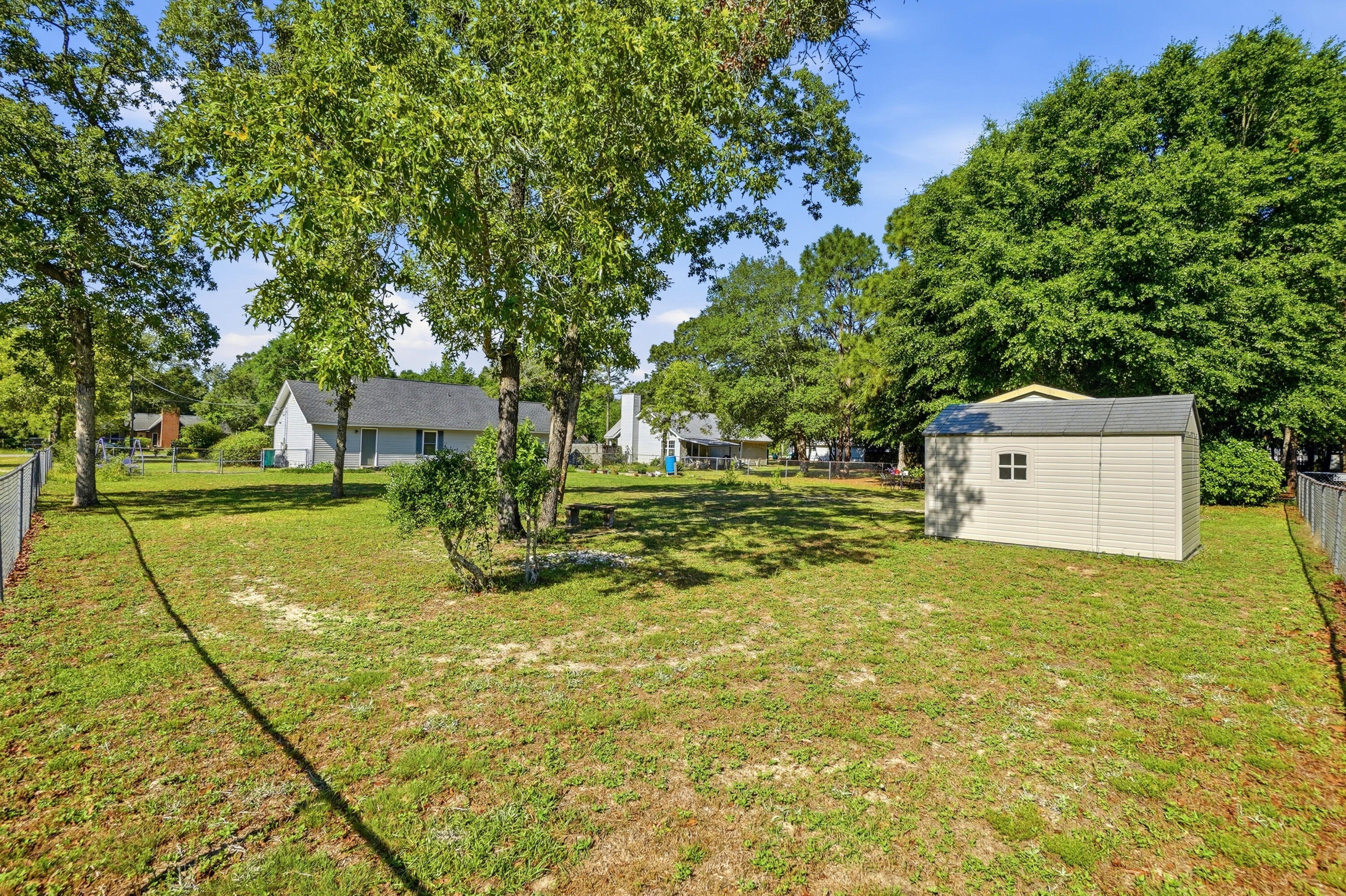 324 John King Road Crestview, FL 32539 - Photo 26 of 28 a view of a house with big yard