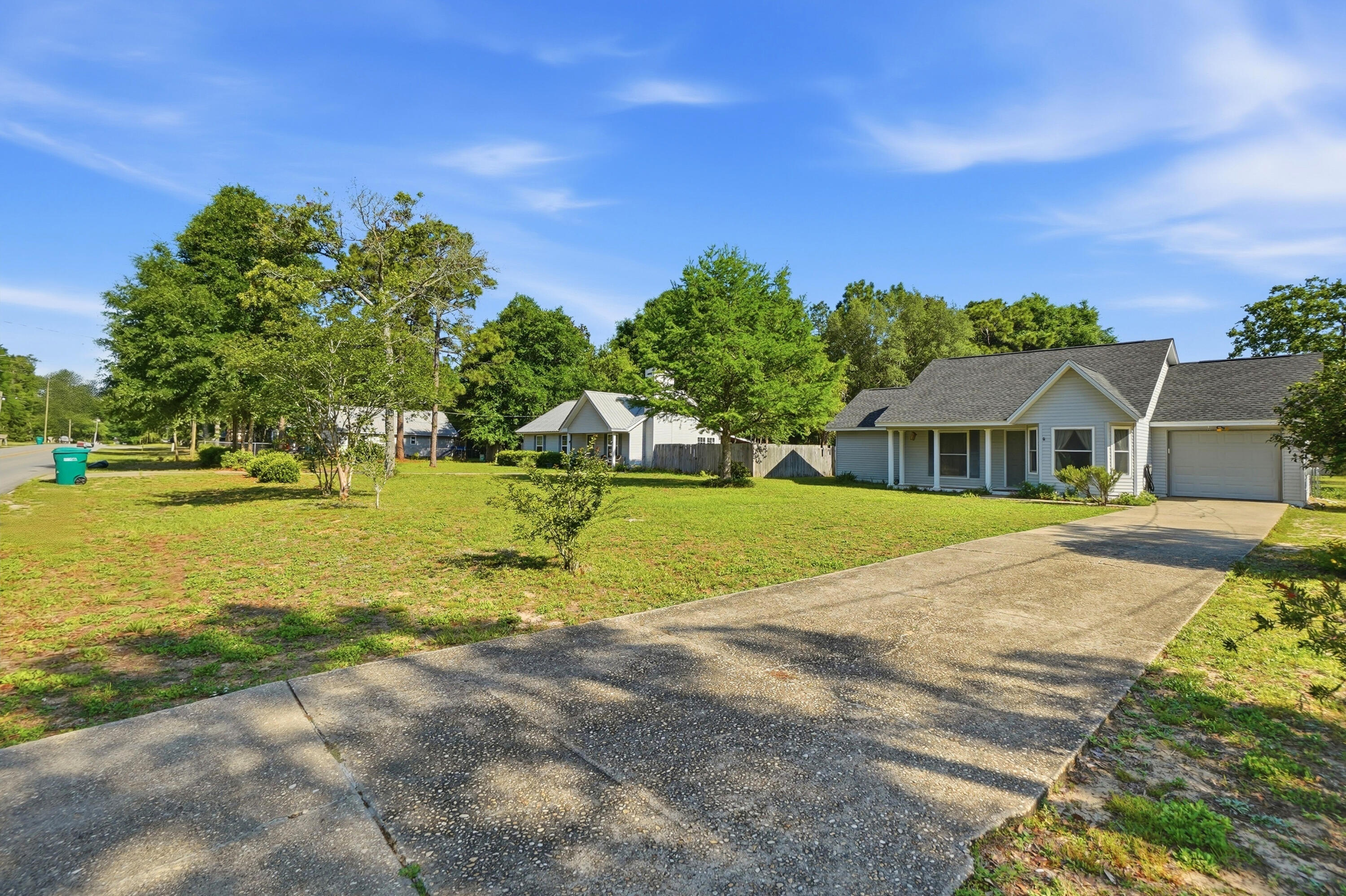 324 John King Road Crestview, FL 32539 - Photo 4 of 28 a view of a house with a big yard