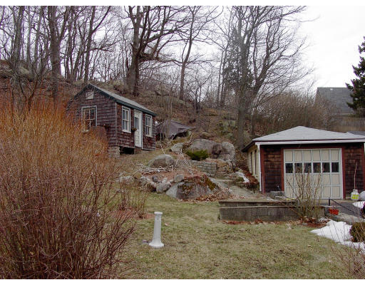 23 Warner Street Gloucester, MA 01930 - Photo 12 of 13 a view of a house with a yard