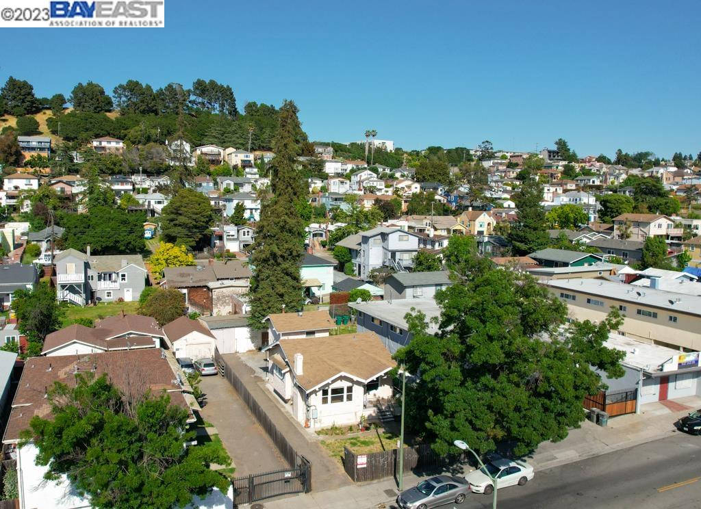 an aerial view of a city with lots of residential buildings