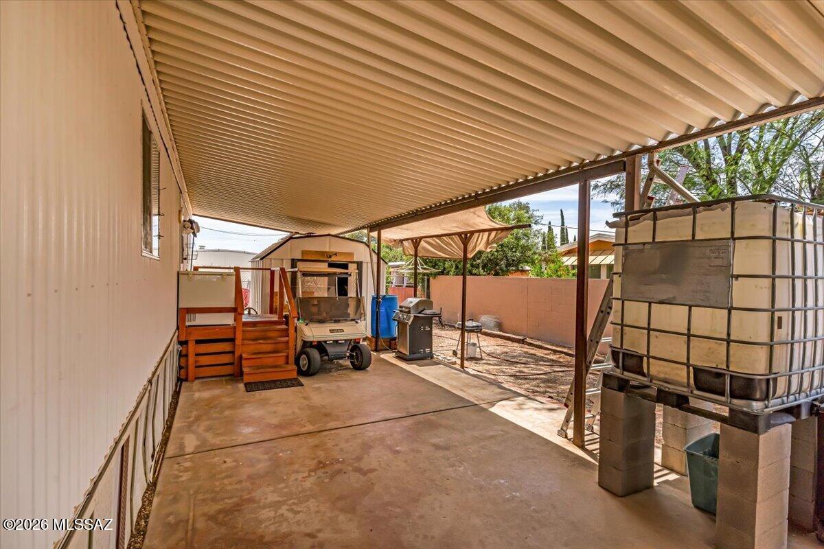 5379 West Rafter Cir Street Tucson, AZ 85713 - Photo 37 of 38 a view of a chairs and table in the patio
