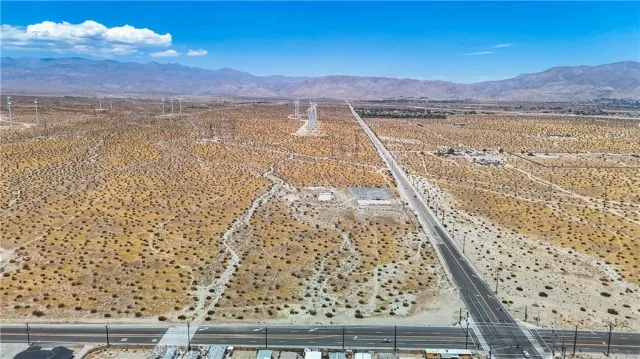 a view of an ocean and a mountain