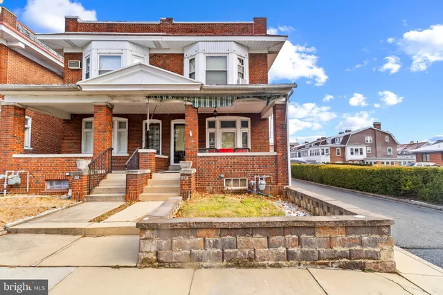 a view of a building with a swimming pool