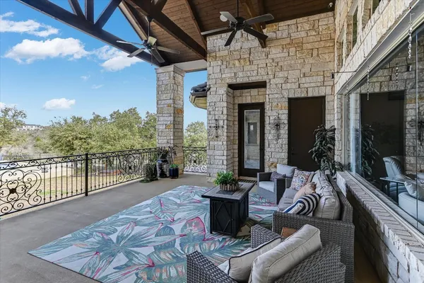 a view of a porch with furniture