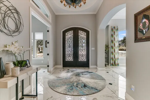 a view of a livingroom with furniture and window