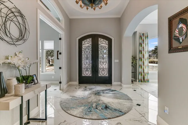 a view of a livingroom with furniture and window