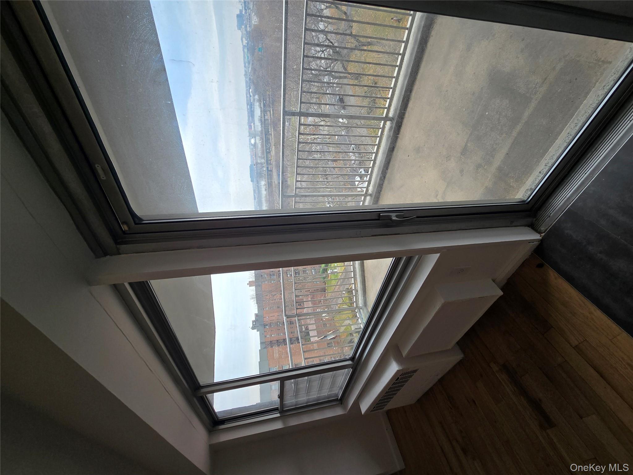 34-12 113th Street, Unit 8G Queens, NY 11368 - Photo 10 of 13 a view of balcony with furniture