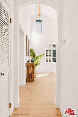 a picture of a living room with a window