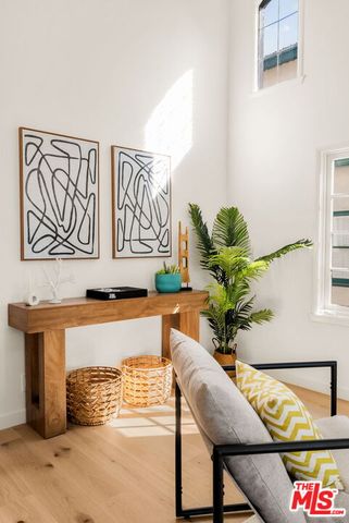 a view of entryway with wooden floor