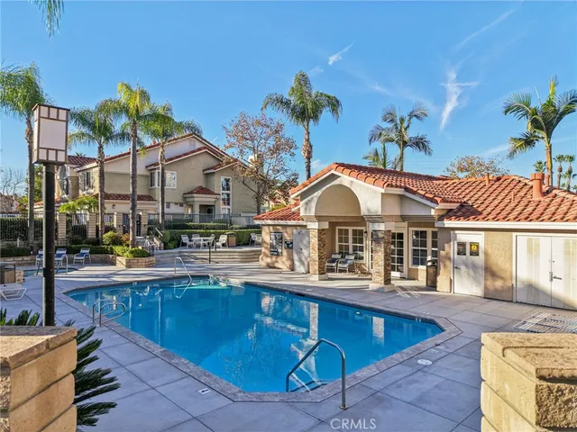 a view of a house with swimming pool