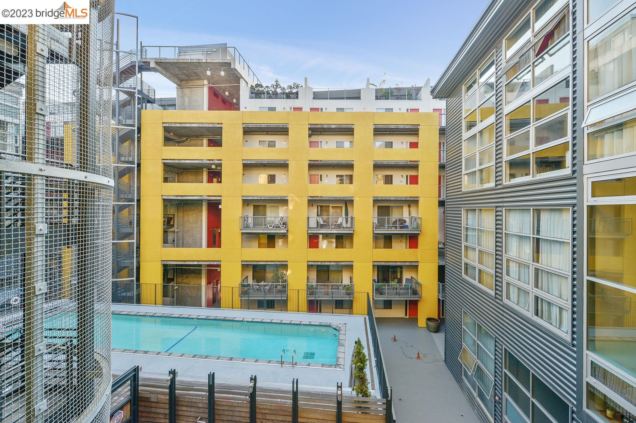 311 Oak Street, Unit PH27 Oakland, CA 94607 - Photo 14 of 21 a view of a building from a balcony