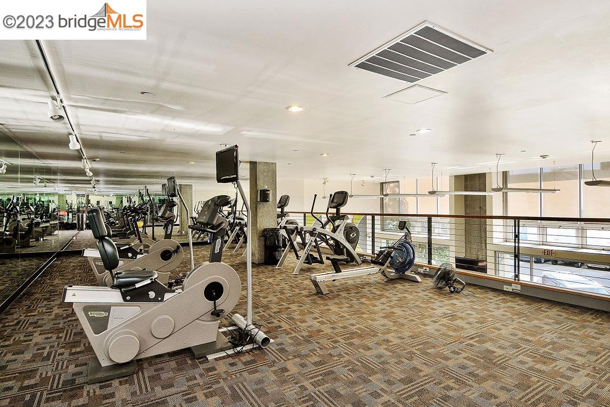 311 Oak Street, Unit PH27 Oakland, CA 94607 - Photo 17 of 21 a view of a room with gym equipment