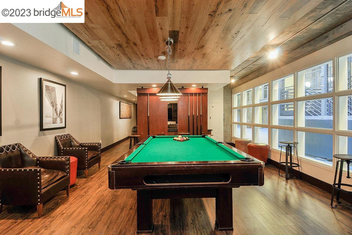 311 Oak Street, Unit PH27 Oakland, CA 94607 - Photo 18 of 21 a room with furniture pool table and a window