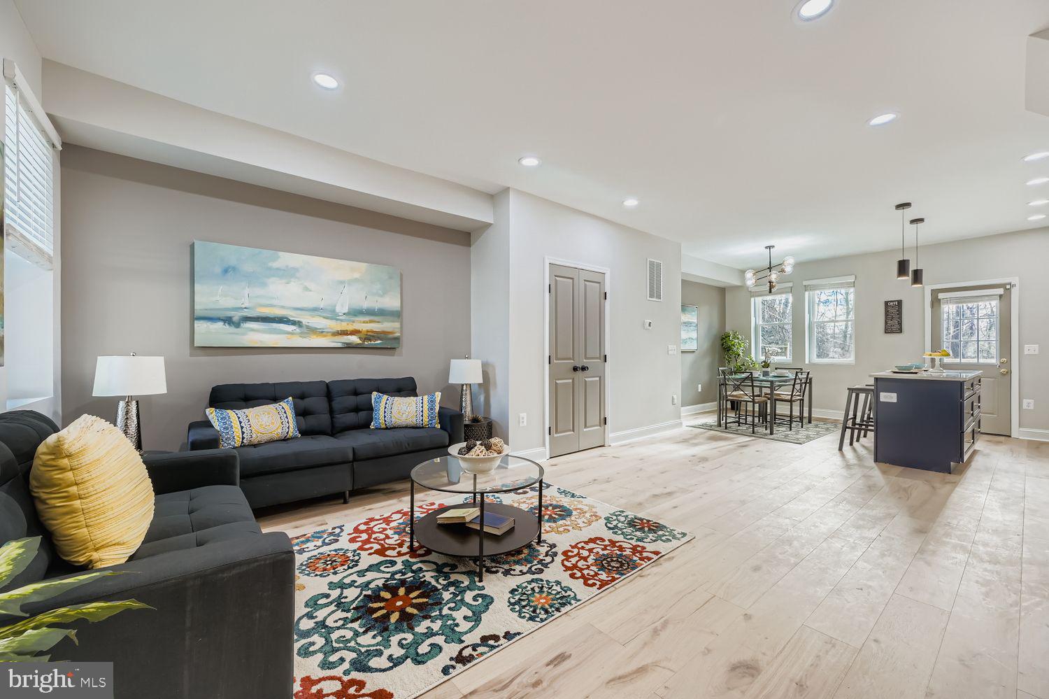 4119 Fairview Avenue Baltimore, MD 21216 - Photo 3 of 25 a living room with furniture and a couch