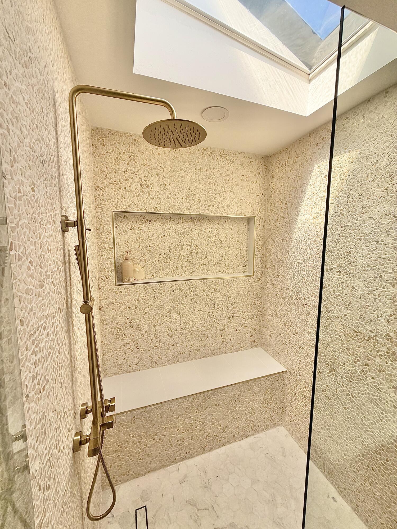 14 Southeast Paddock Circle Jupiter, FL 33469 - Photo 11 of 45 a bathroom with a shower