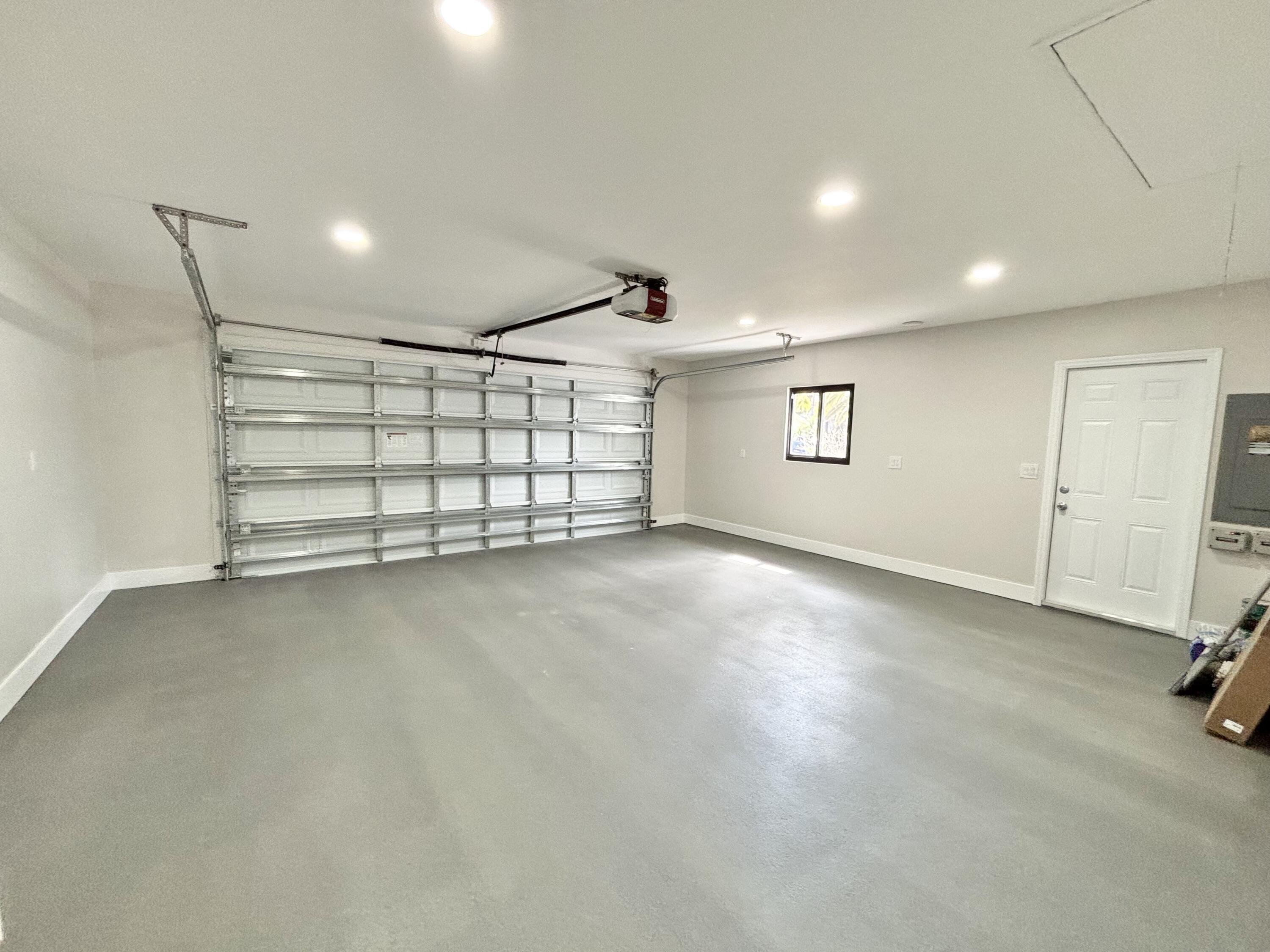 14 Southeast Paddock Circle Jupiter, FL 33469 - Photo 36 of 45 an empty room with a empty space and windows