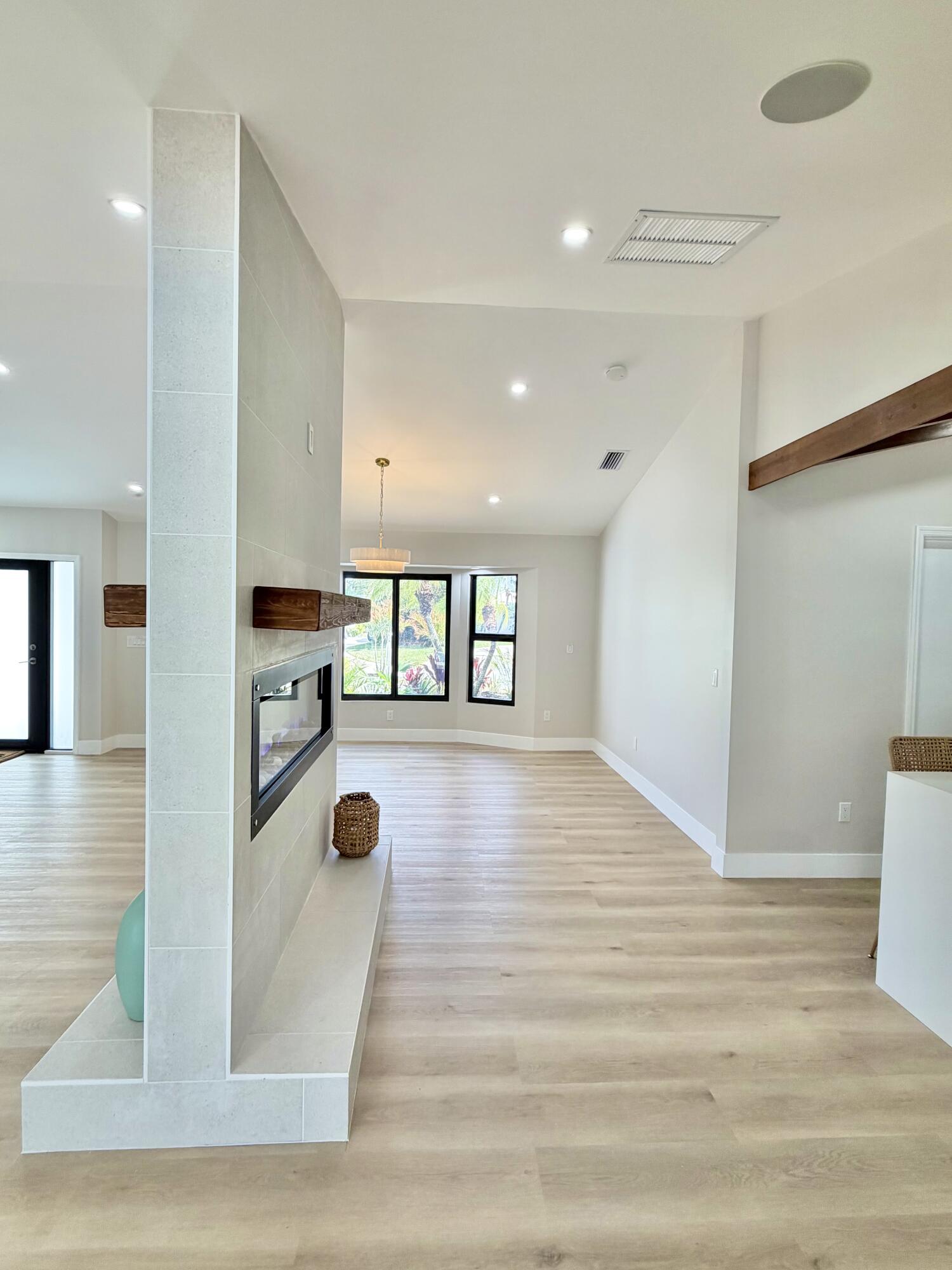 14 Southeast Paddock Circle Jupiter, FL 33469 - Photo 4 of 45 a view of livingroom with hardwood floor