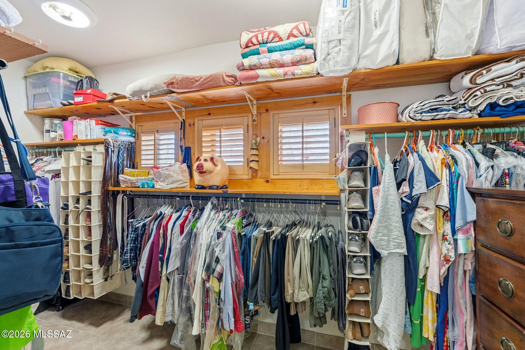 12810 West Gunsmoke Road Tucson, AZ 85736 - Photo 24 of 51 a view of walk in closet with clothes