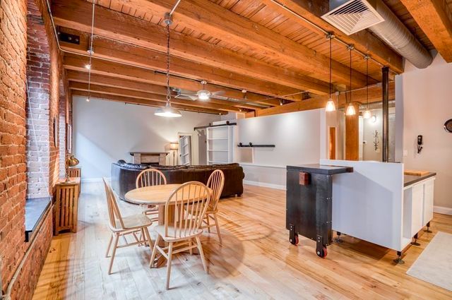 a view of a chairs and table in a patio