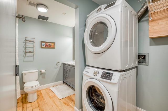 a view of a bathroom with a washer and dryer
