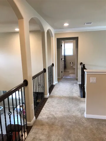 a view of hallway with livingroom