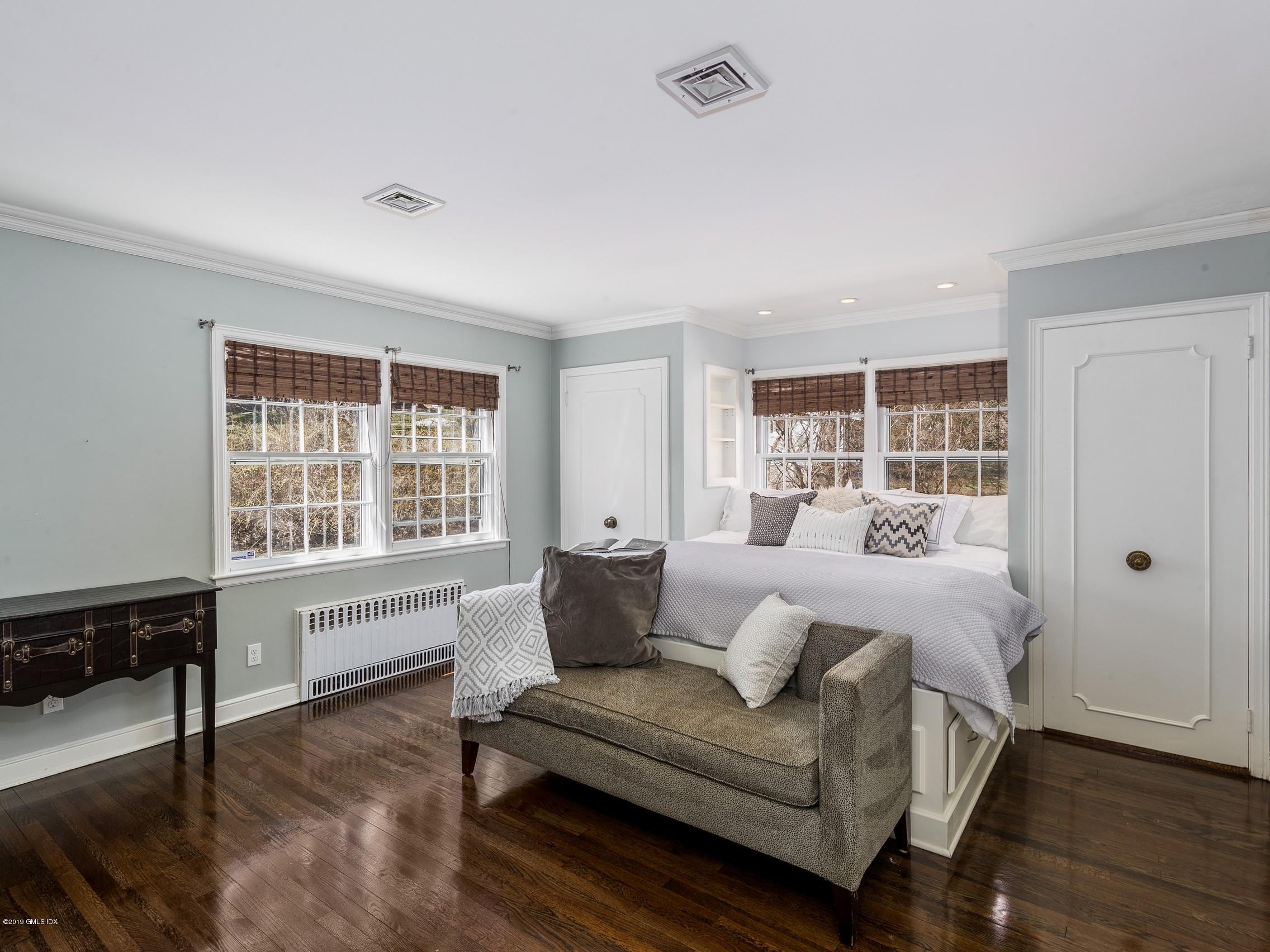 66 Bruce Park Drive Greenwich, CT 06830 - Photo 11 of 27 a living room with furniture and a window