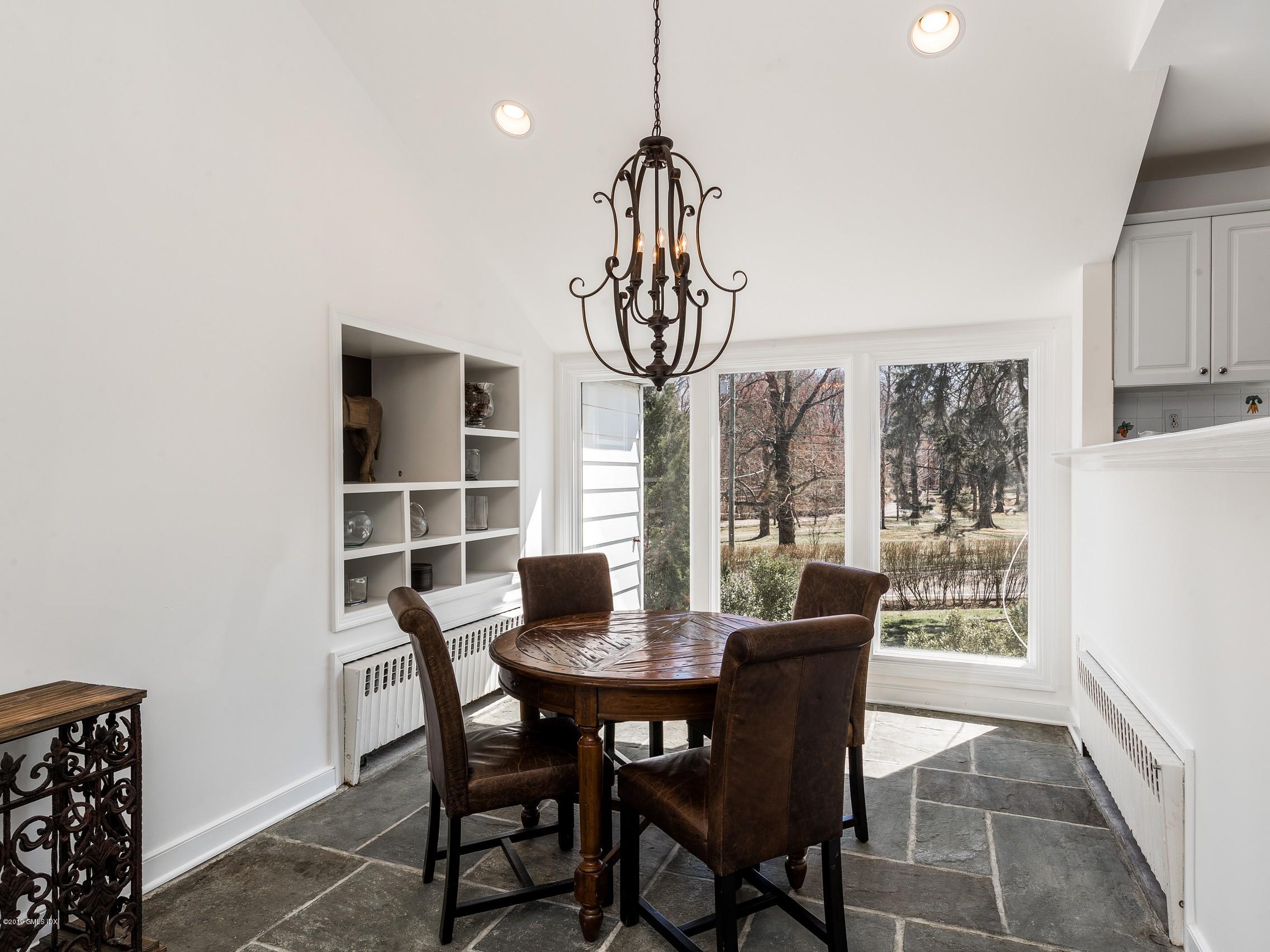 66 Bruce Park Drive Greenwich, CT 06830 - Photo 10 of 27 a view of a dining room with furniture window and outside view