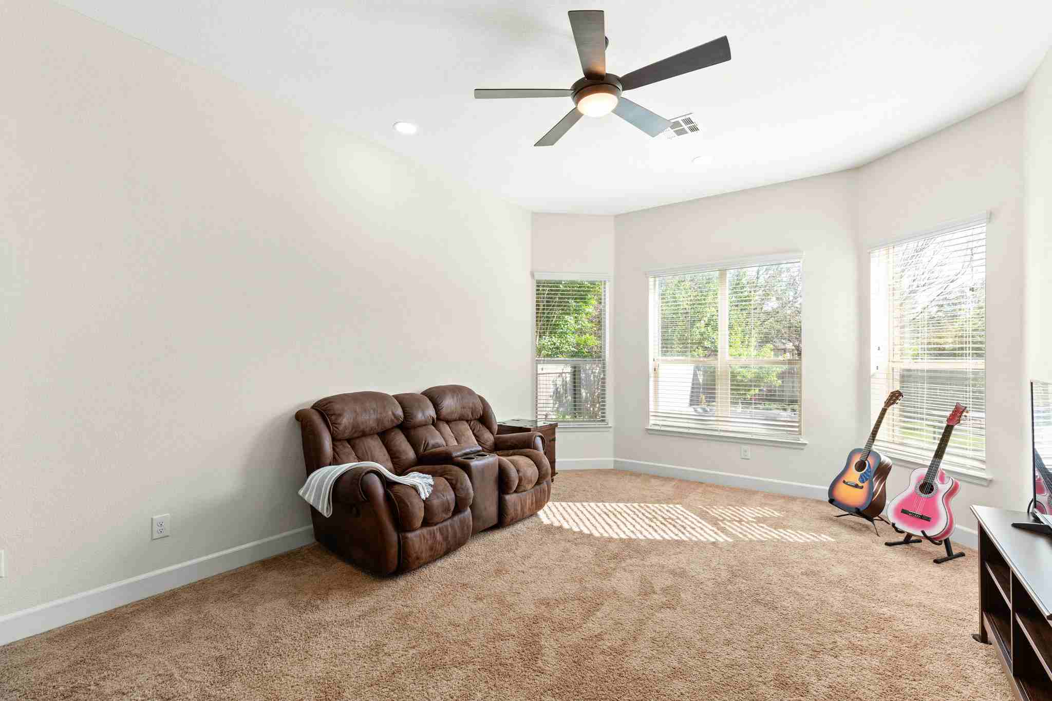 2525 Quick Fort Drive Leander, TX 78641 - Photo 16 of 39 a living room with furniture and a window