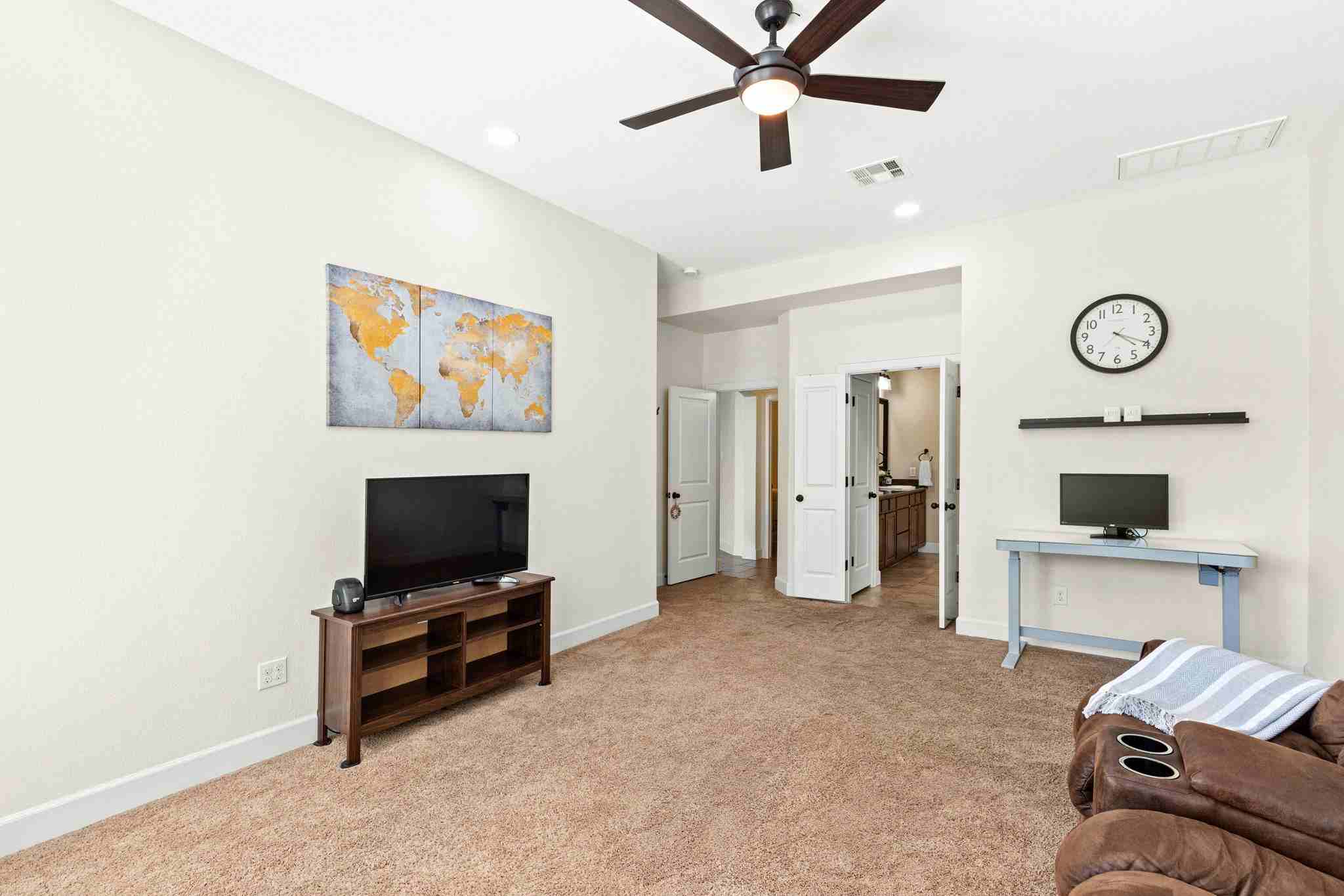 2525 Quick Fort Drive Leander, TX 78641 - Photo 17 of 39 a view of room with workspace and a ceiling fan