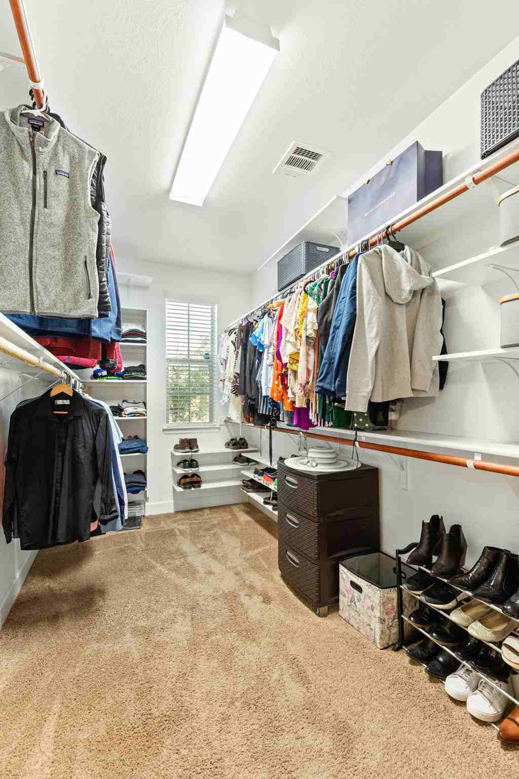 2525 Quick Fort Drive Leander, TX 78641 - Photo 20 of 39 a view of walk in closet with clothes and shoes