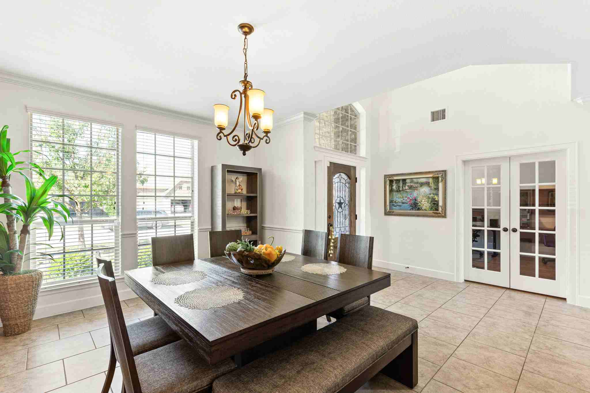 2525 Quick Fort Drive Leander, TX 78641 - Photo 7 of 39 a view of a dining room with furniture wooden floor and chandelier
