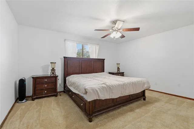 a bedroom with a bed and a closet