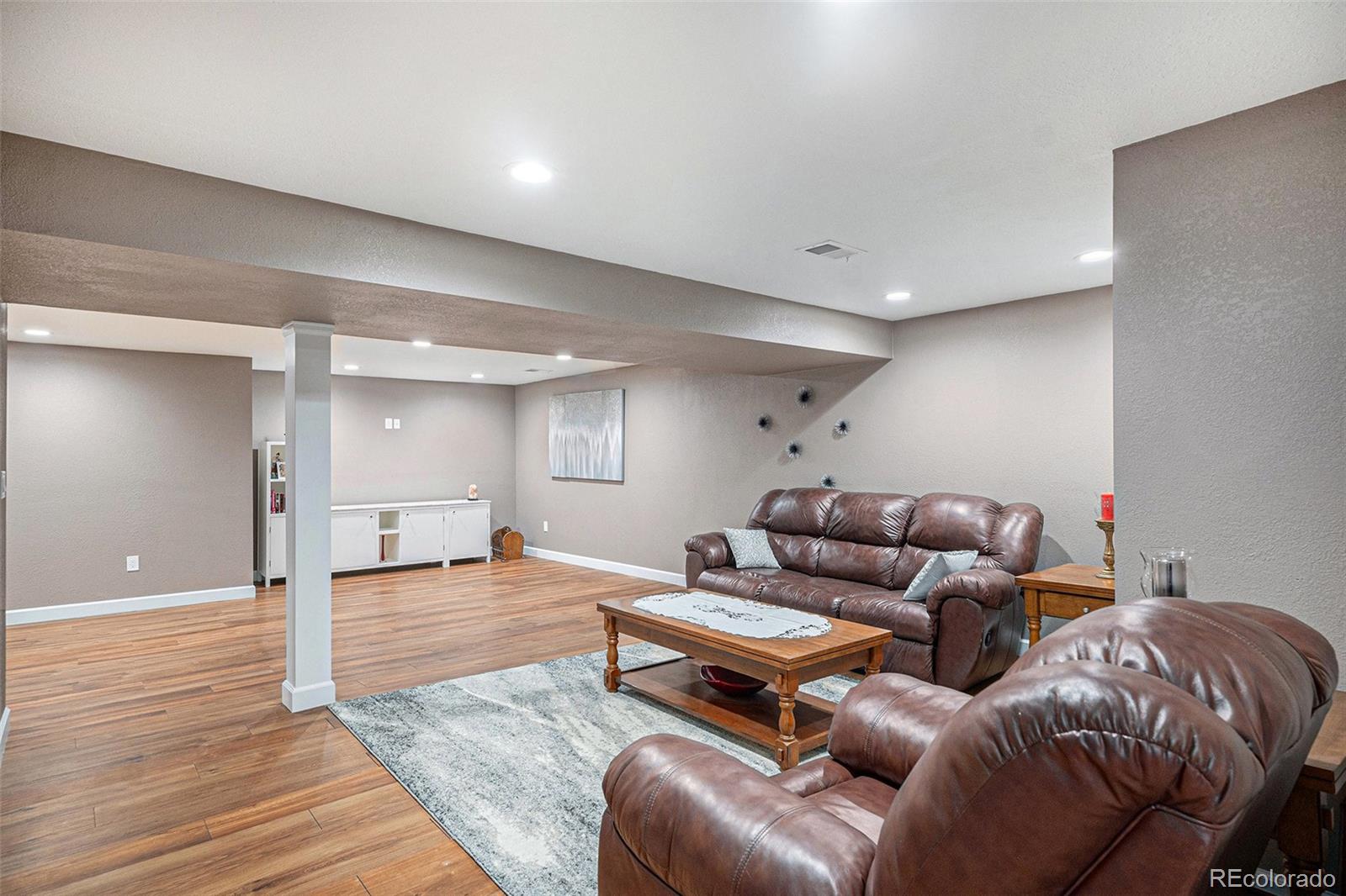 904 Fieldstone Place Highlands Ranch, CO 80126 - Photo 15 of 28 a living room with furniture