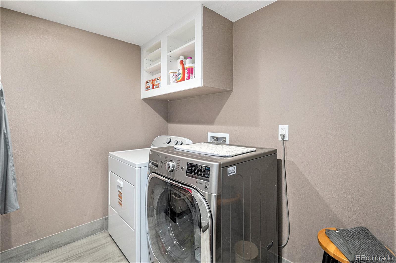 904 Fieldstone Place Highlands Ranch, CO 80126 - Photo 19 of 28 a utility room with dryer and washer