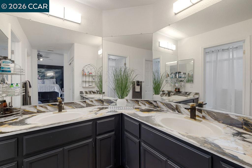 645 Anderson Way Rio Vista, CA 94571 - Photo 11 of 47 a bathroom with a sink and a mirror