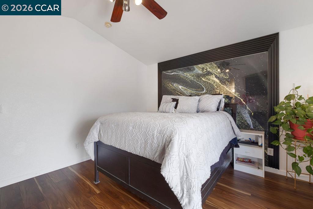645 Anderson Way Rio Vista, CA 94571 - Photo 13 of 47 a bed sitting in a bedroom next to a window