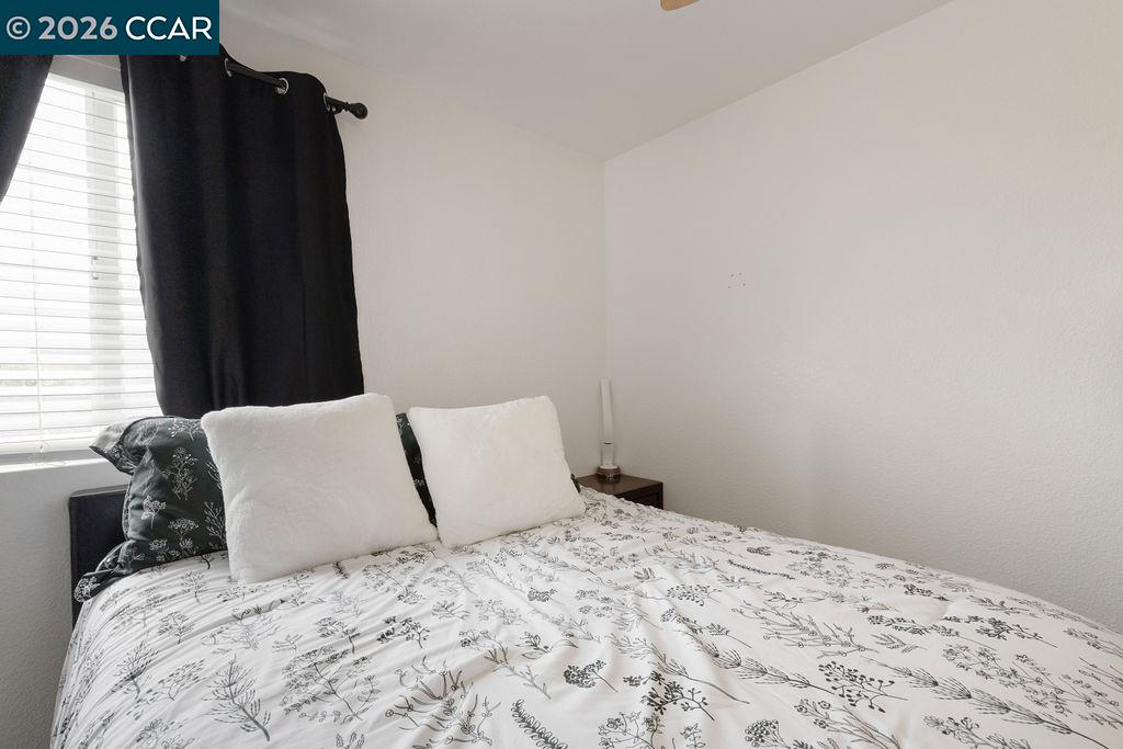 645 Anderson Way Rio Vista, CA 94571 - Photo 21 of 47 a bedroom with a bed and a window