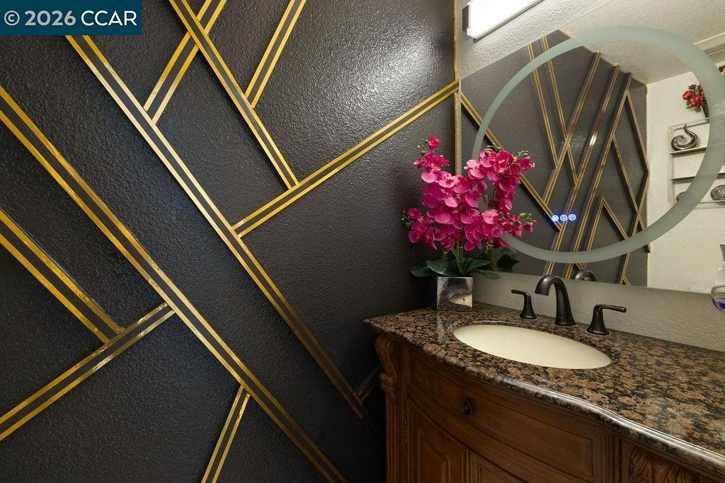 645 Anderson Way Rio Vista, CA 94571 - Photo 27 of 47 a bathroom with a sink and a mirror