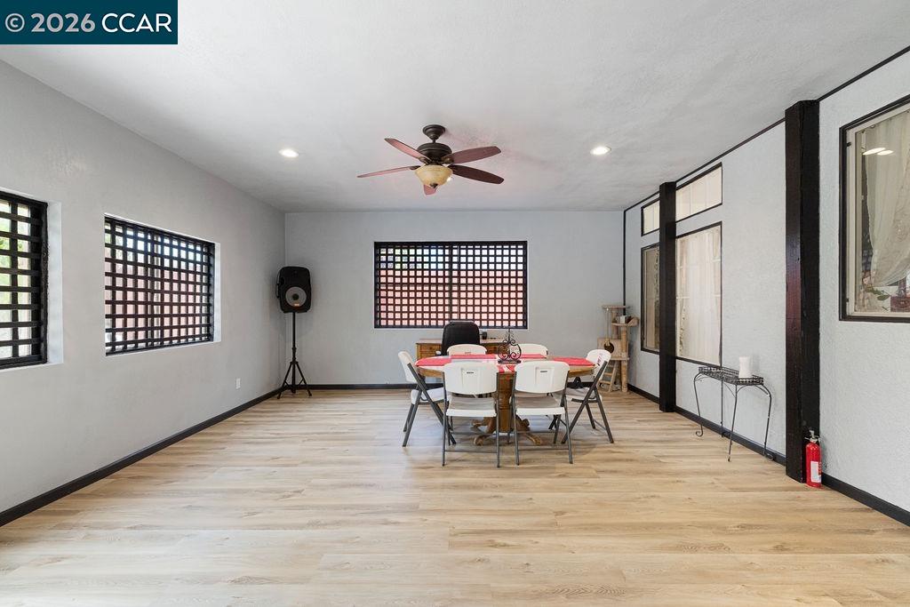 645 Anderson Way Rio Vista, CA 94571 - Photo 35 of 47 a view of a dining room with furniture window and wooden floor