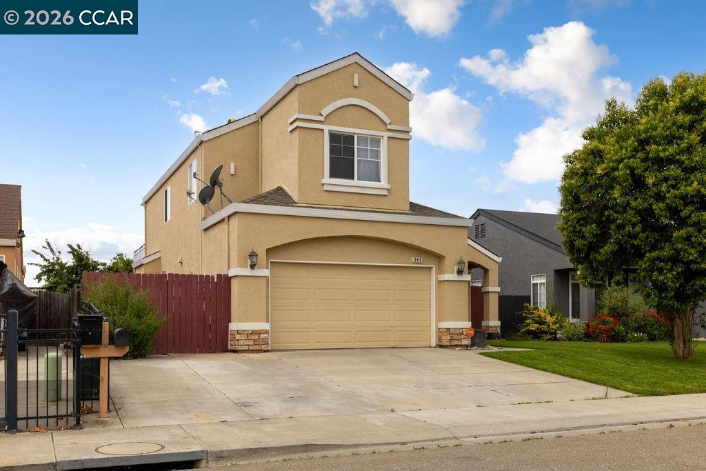 645 Anderson Way Rio Vista, CA 94571 - Photo 43 of 47 a front view of a house with a garden and trees