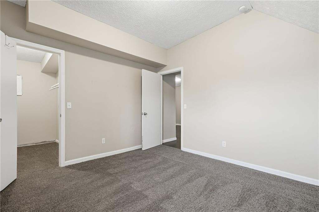212 Chandler Street, Unit 4 Calhoun, GA 30701 - Photo 13 of 17 a view of an empty room