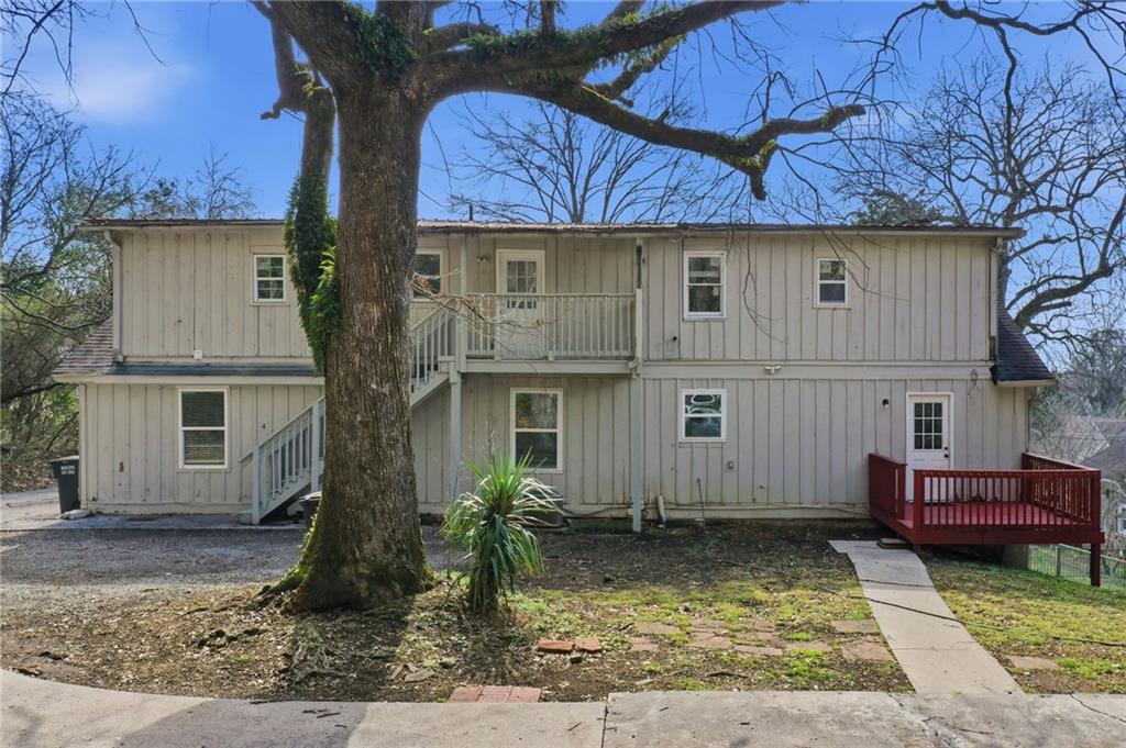 212 Chandler Street, Unit 4 Calhoun, GA 30701 - Photo 16 of 17 a view of a house with a patio
