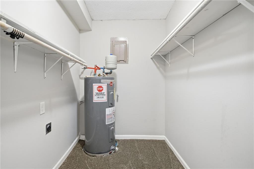 212 Chandler Street, Unit 4 Calhoun, GA 30701 - Photo 7 of 17 a view of a storage & utility room with closet