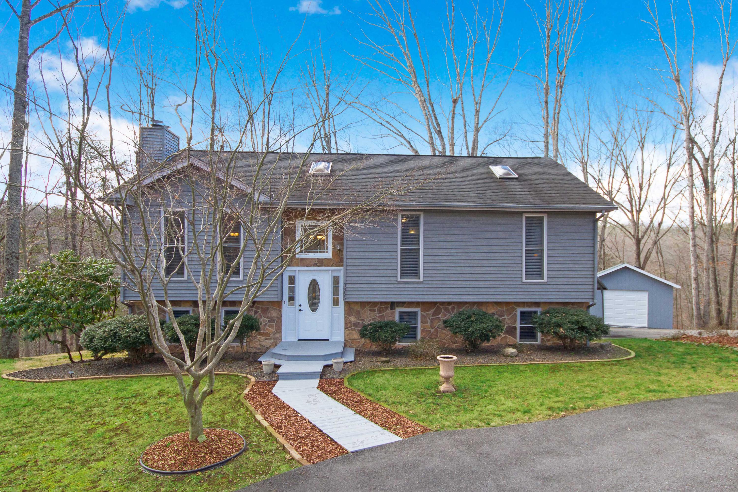 3355 Turner Branch Road Vinton, VA 24179 - Photo 1 of 58 a front view of a house with garden