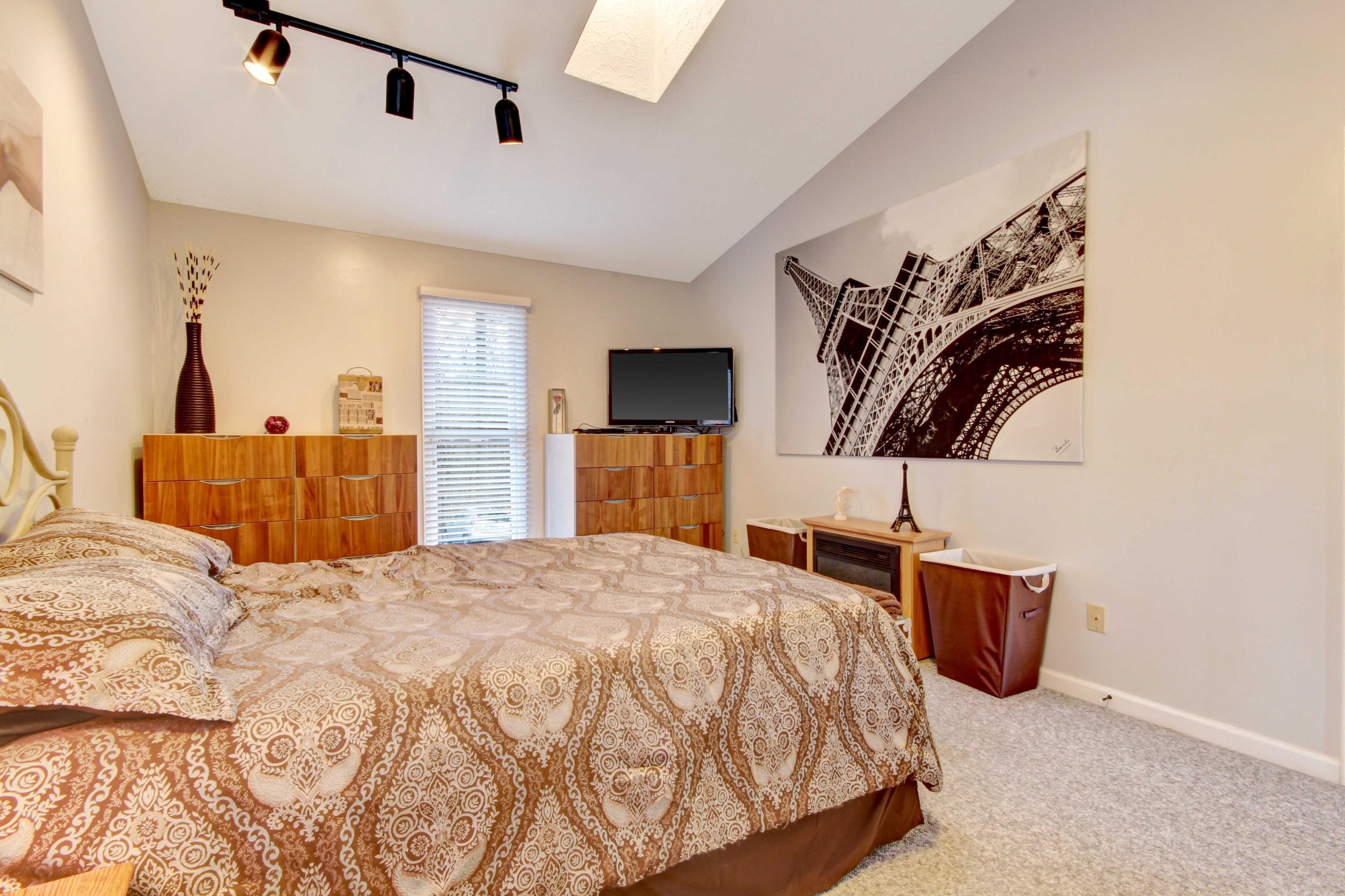 3355 Turner Branch Road Vinton, VA 24179 - Photo 14 of 58 a bedroom with a bed and a flat screen tv